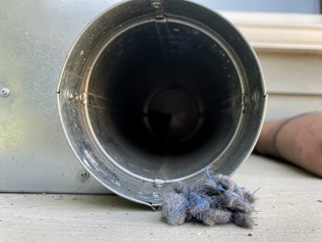 La Cañada Flintridge Dryer Vent Cleaning technician using specialized equipment to clear severe dryer vent blockage in La Cañada Flintridge